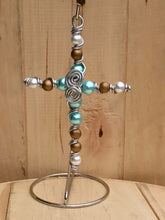 Load image into Gallery viewer, Teal and Gold Beaded Display Cross with Swirled Center and Silver Stand