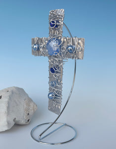 Silver Aluminum Display Cross with Blue Beads and a Silver Stand