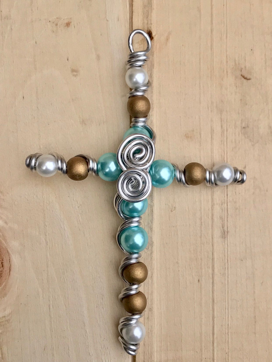 Teal and Gold Beaded Display Cross with Swirled Center and Silver Stand