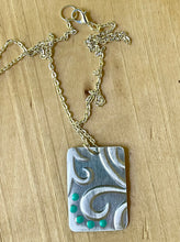Load image into Gallery viewer, Silver Swirl Pendant Necklace/Silver Pressed Metal Design Necklace/Rectangle Necklace/Painted Necklace/Light Weight Necklace/Teal Necklace