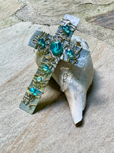 Load image into Gallery viewer, Hammered Aluminum Display Cross Embellished with Gold Wire and Turquoise Colored Beads. Includes a Silver Stand