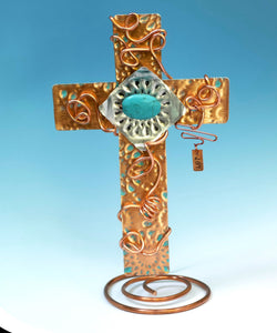 Embossed Copper Colored Display Cross with Copper Wire and Turquoise Bead Accents. Natural Copper Stand Included.